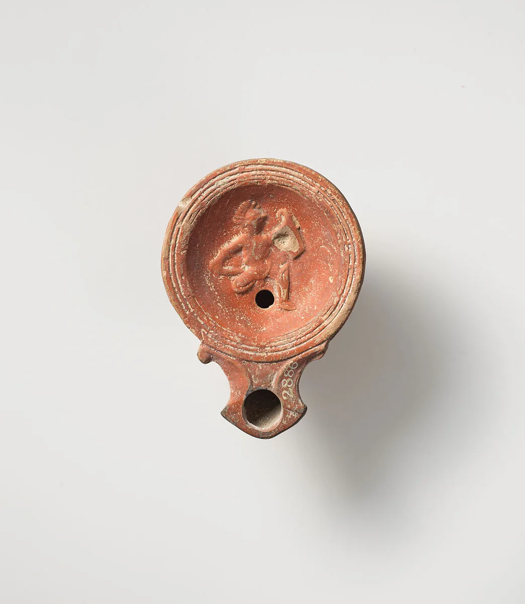 Terracotta oil lamp — Unknown