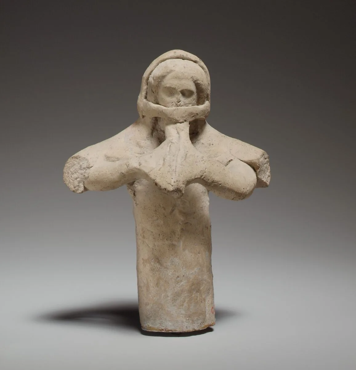 Standing female flute player — Unknown