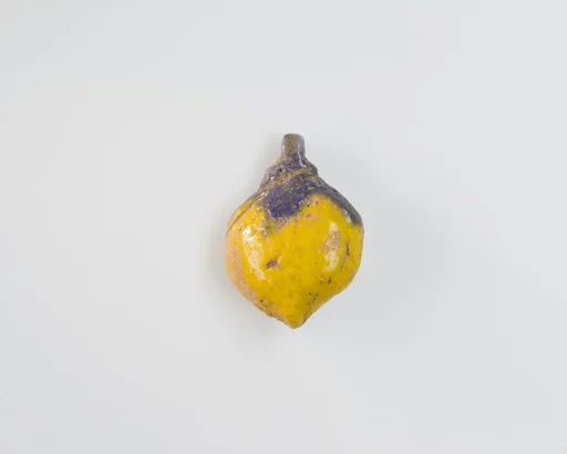 Bead in the Form of a Mandrake Fruit