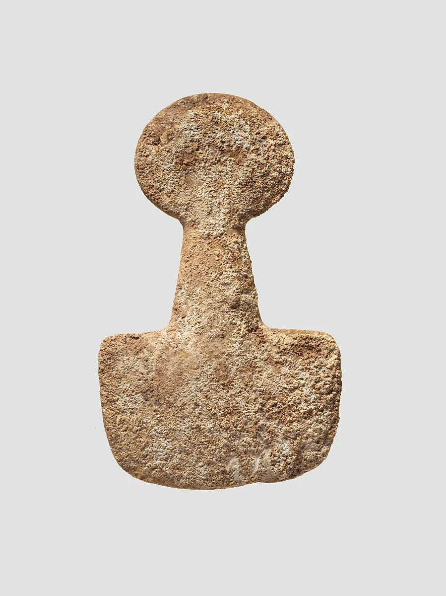 Spade-shaped schematic female (?) figure — Unknown