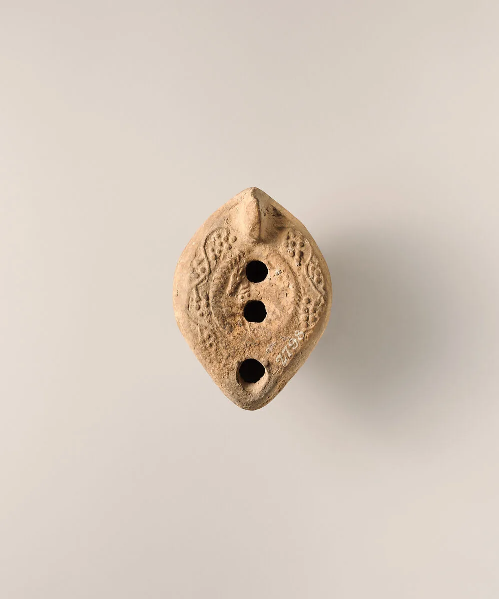 Terracotta oil lamp — Unknown