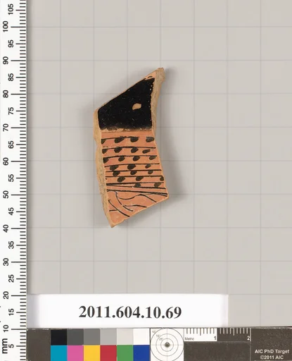 Terracotta fragment of a kylix (drinking cup)