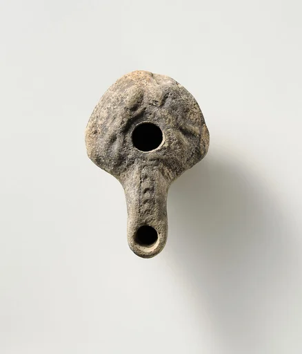 Terracotta oil lamp