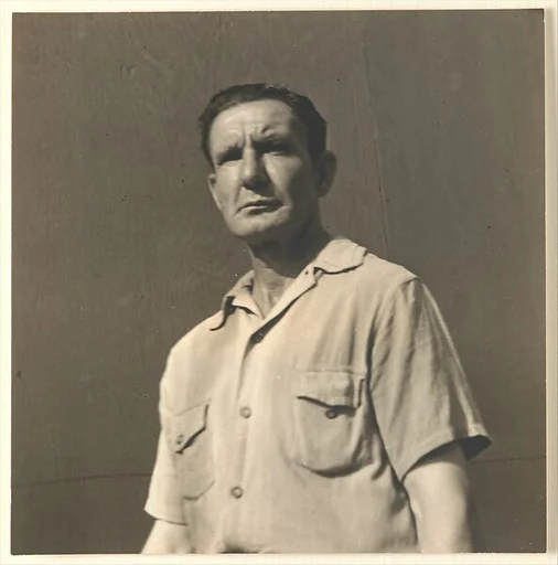 [Male Pedestrian in Short Sleeves, Looking at Camera, Detroit (for Fortune Magazine Article "Labor Anonymous")]