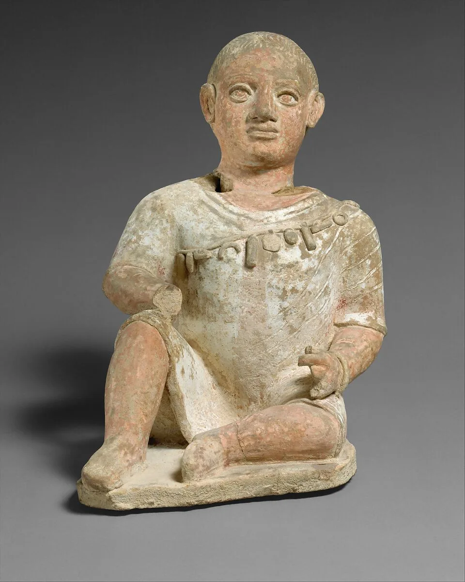 Seated boy — Unknown
