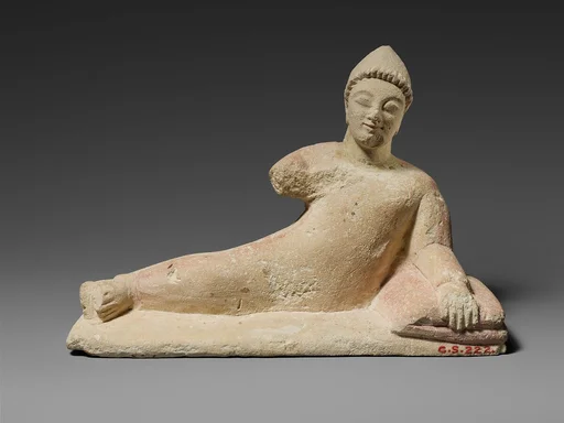 Limestone statuette of a recumbent votary (worshipper)