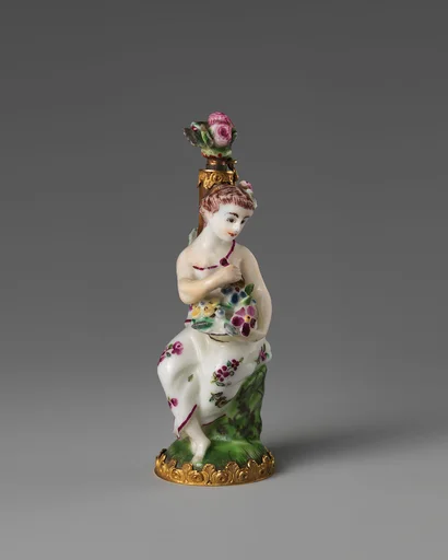 Girl with a basket of flowers
