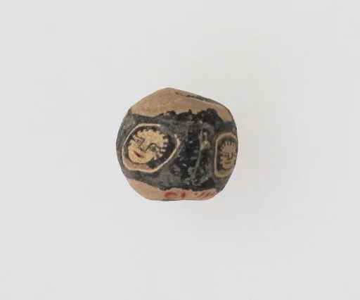 Glass mosaic face bead
