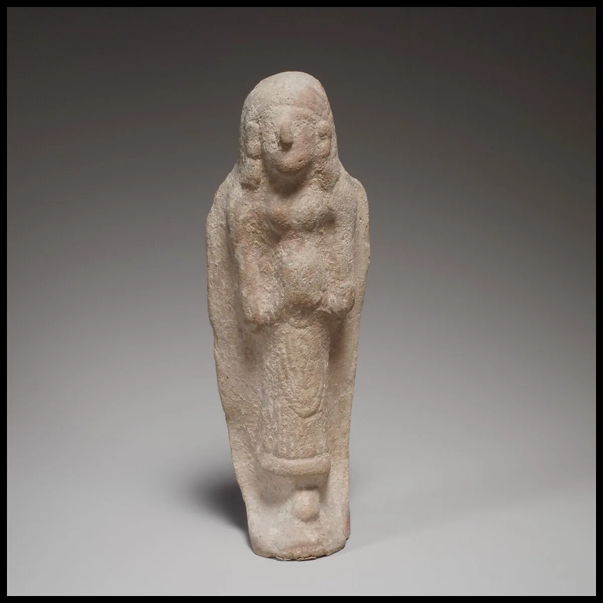 Standing female figurine — Unknown