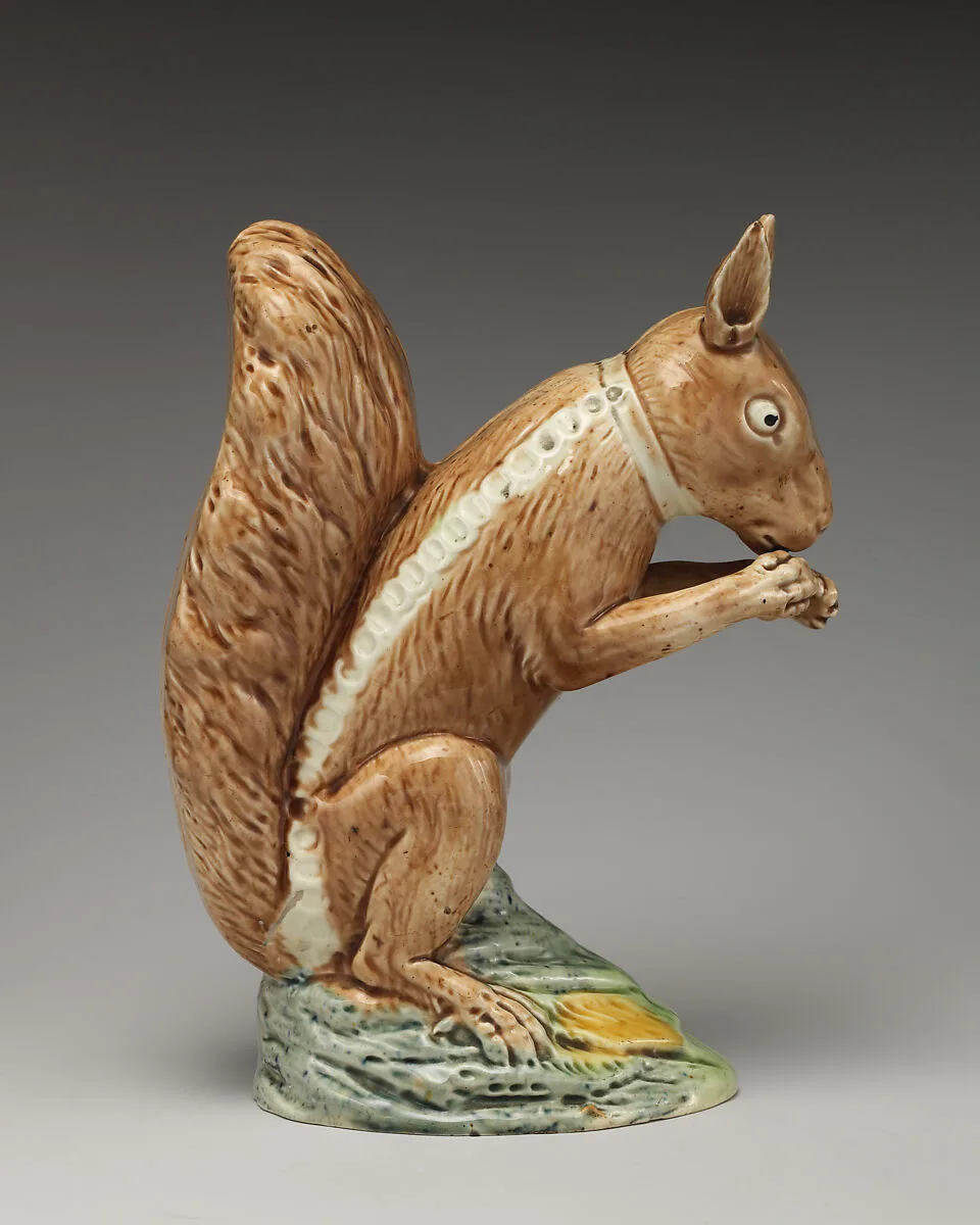 Brown squirrel with collar and chain — Ralph Wood the Younger