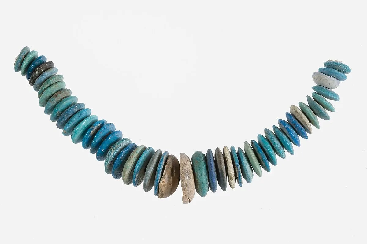 String of Large Lozenge-Shaped Beads — Unknown