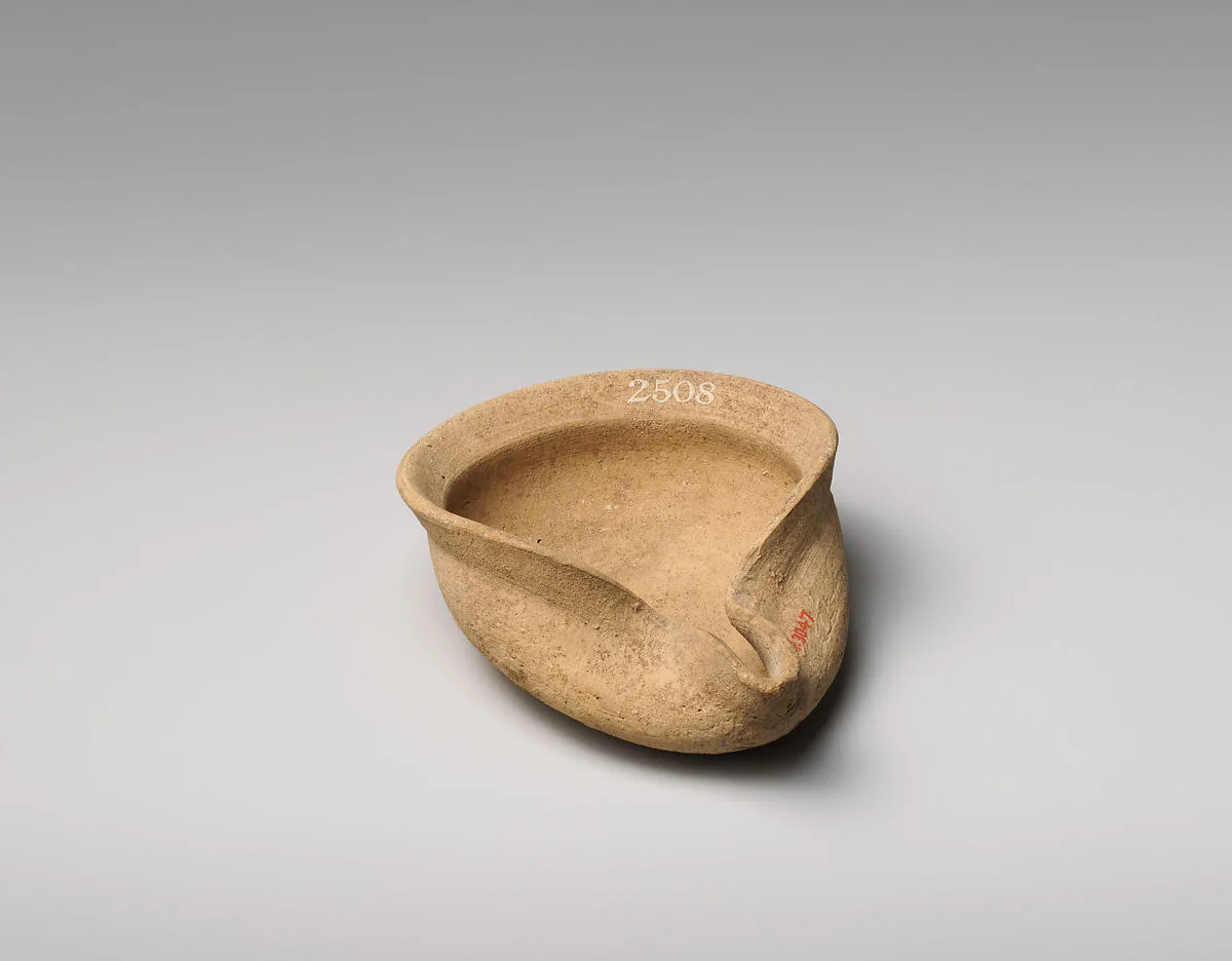 Terracotta saucer-shaped lamp — Unknown