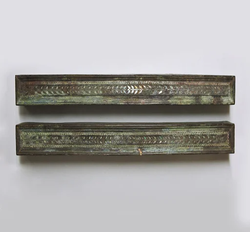 Bronze furniture attachments with silver inlay