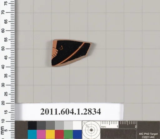 Terracotta fragment of a kylix (drinking cup)