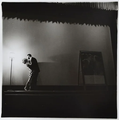 A couple kissing on stage, N.Y.C. 