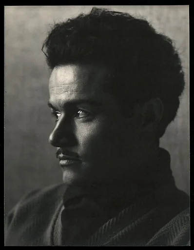 [Young Man with Dark Hair and Mustache]