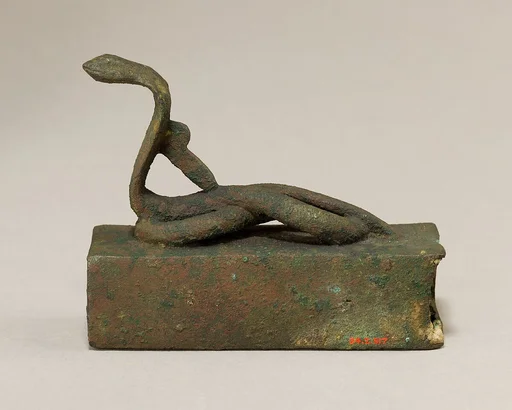 Box for an animal mummy surmounted by a coiled, rearing snake