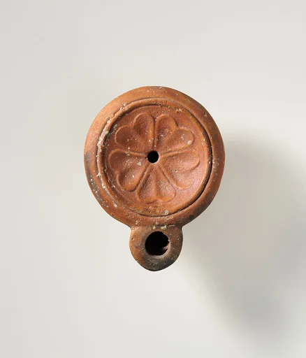 Terracotta oil lamp