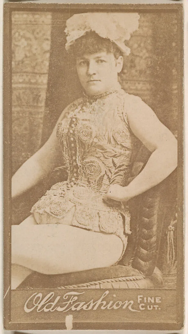 Actress seated in chair, from the Actresses series (N664) promoting Old Fashion Fine Cut Tobacco — Unknown