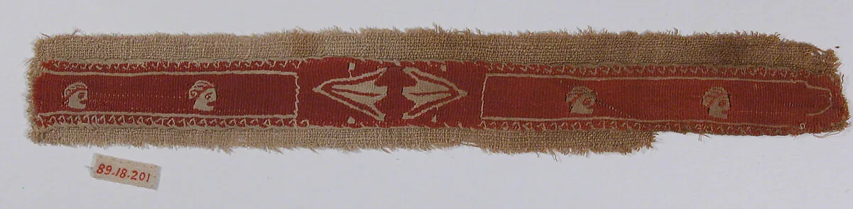 Band Fragment with Mask and Lotus Flowers — Unknown