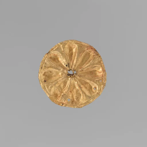 Gold roundel with stamped designs