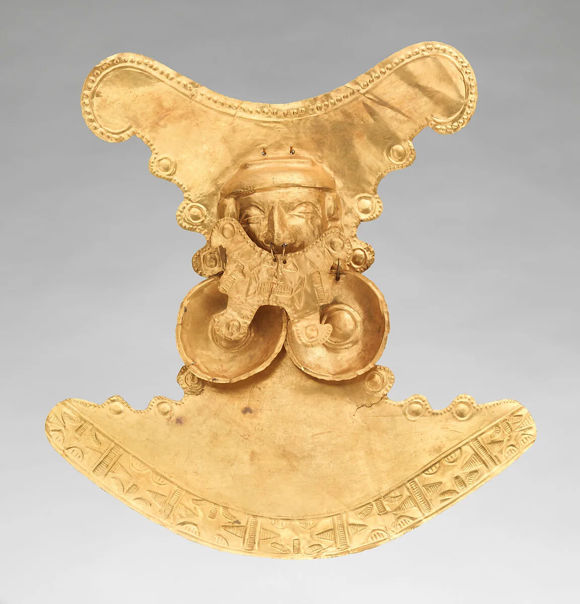 Pectoral with Face — Calima (Yotoco) artist