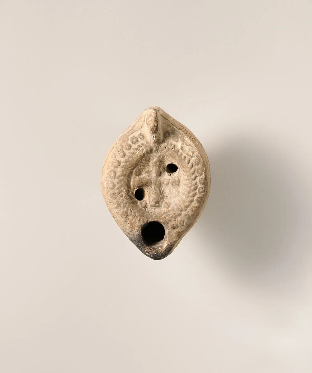 Terracotta oil lamp — Unknown