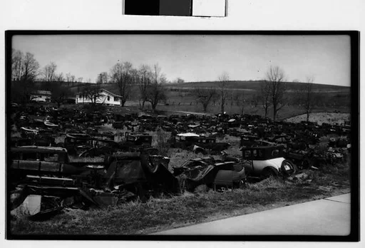 [Auto Graveyard in Field]