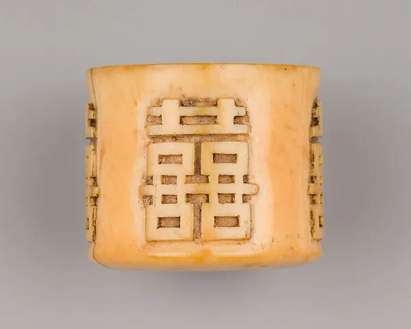 Ivory Archer's Ring Carved with Characters in Relief — Unknown