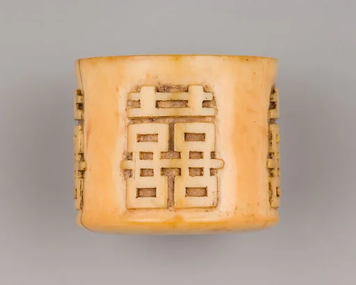 Ivory Archer's Ring Carved with Characters in Relief