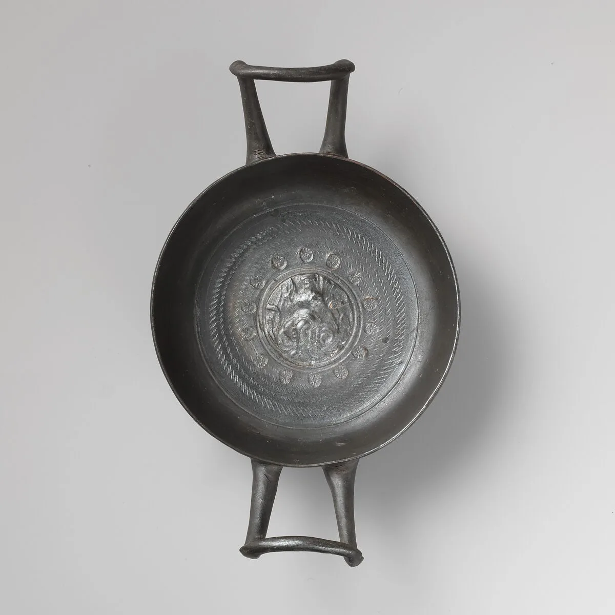 Terracotta stemless kylix (drinking cup) — Unknown