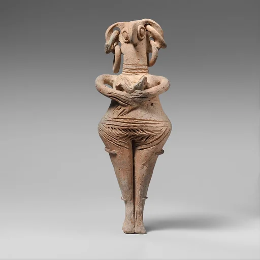 Terracotta statuette of woman with bird face