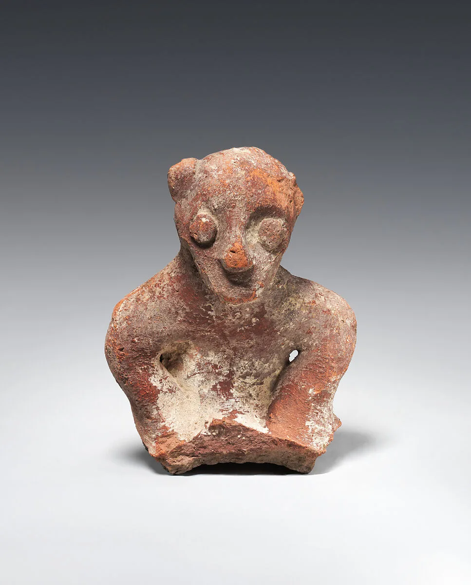 Figurine of a Head and Torso of a Man — Unknown