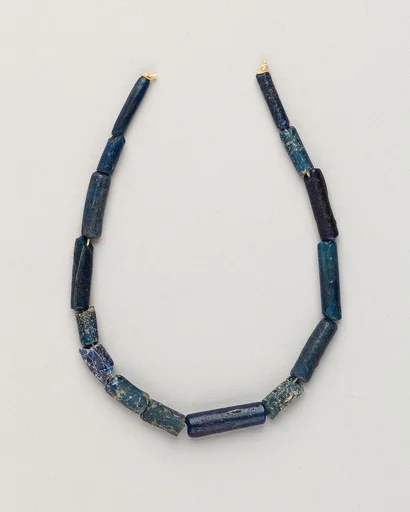 String of 15 bugle beads
