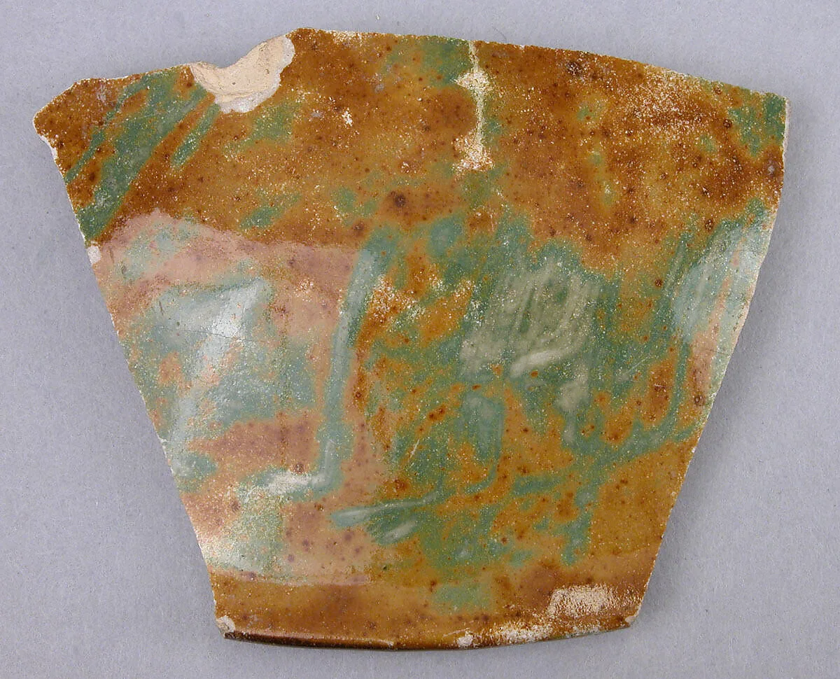 Fragment of a Lotus-Shaped Bowl with Luster and Green-Mottled Decoration — Unknown