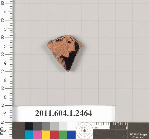 Terracotta fragment of a kylix (drinking cup)