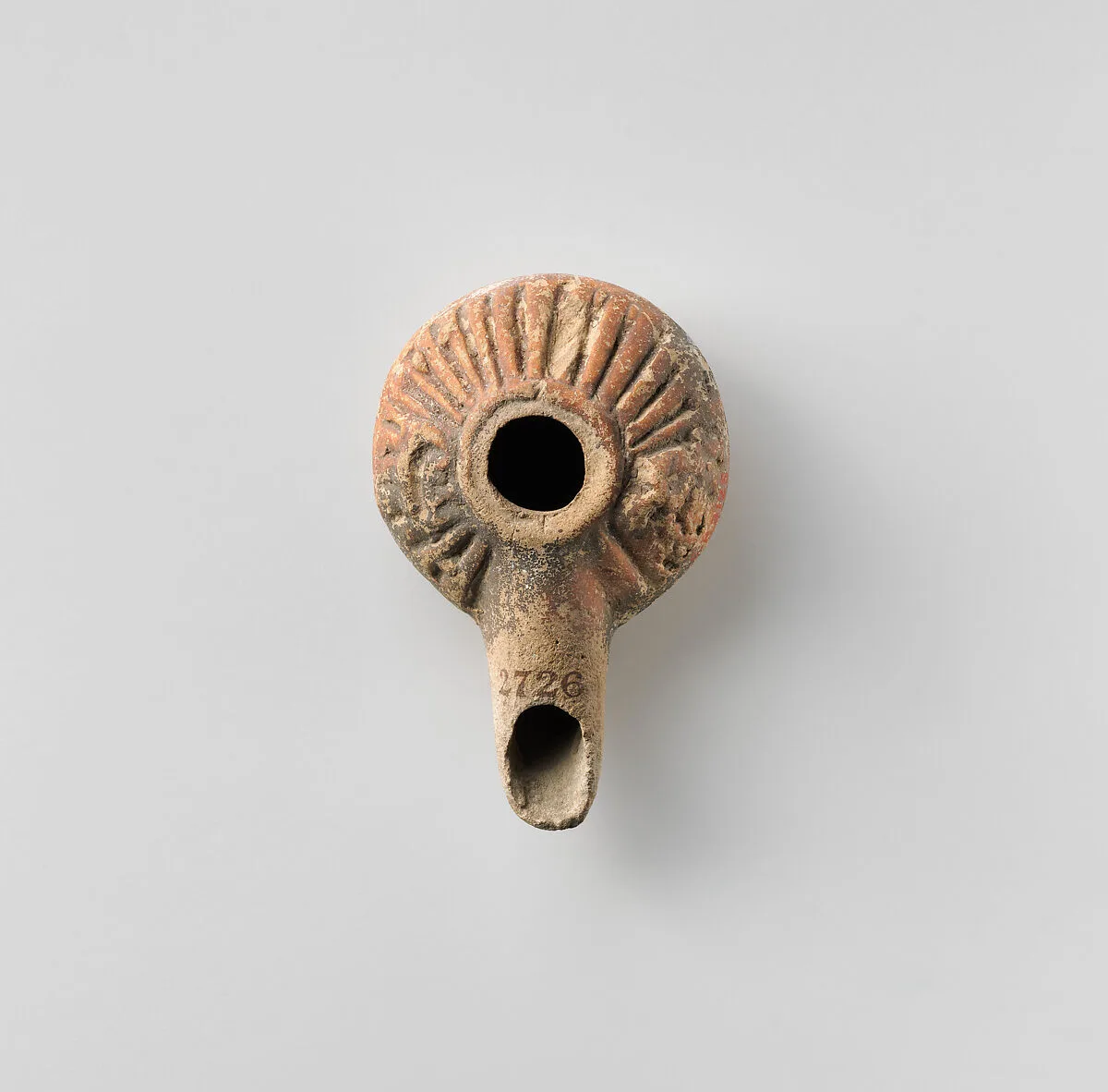 Terracotta oil lamp — Unknown