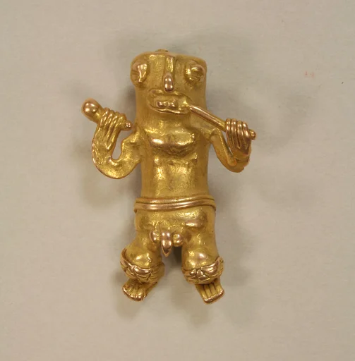 Cast Gold Pendant of Man with Flute