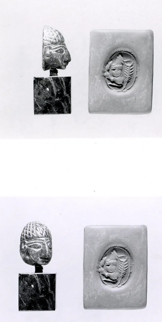 Stamp seal (in the shape of a human head) with animal — Unknown