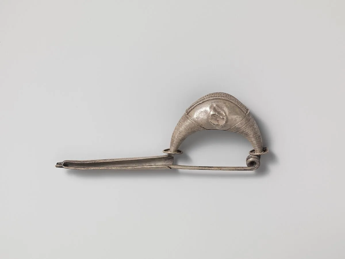 Silver navicella-type fibula (safety pin) — Unknown