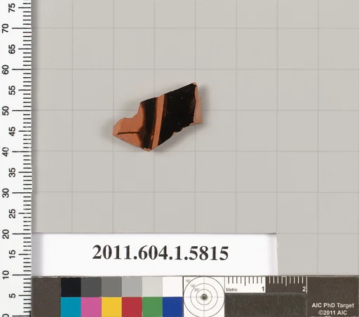 Terracotta fragment of a kylix: eye-cup (drinking cup)