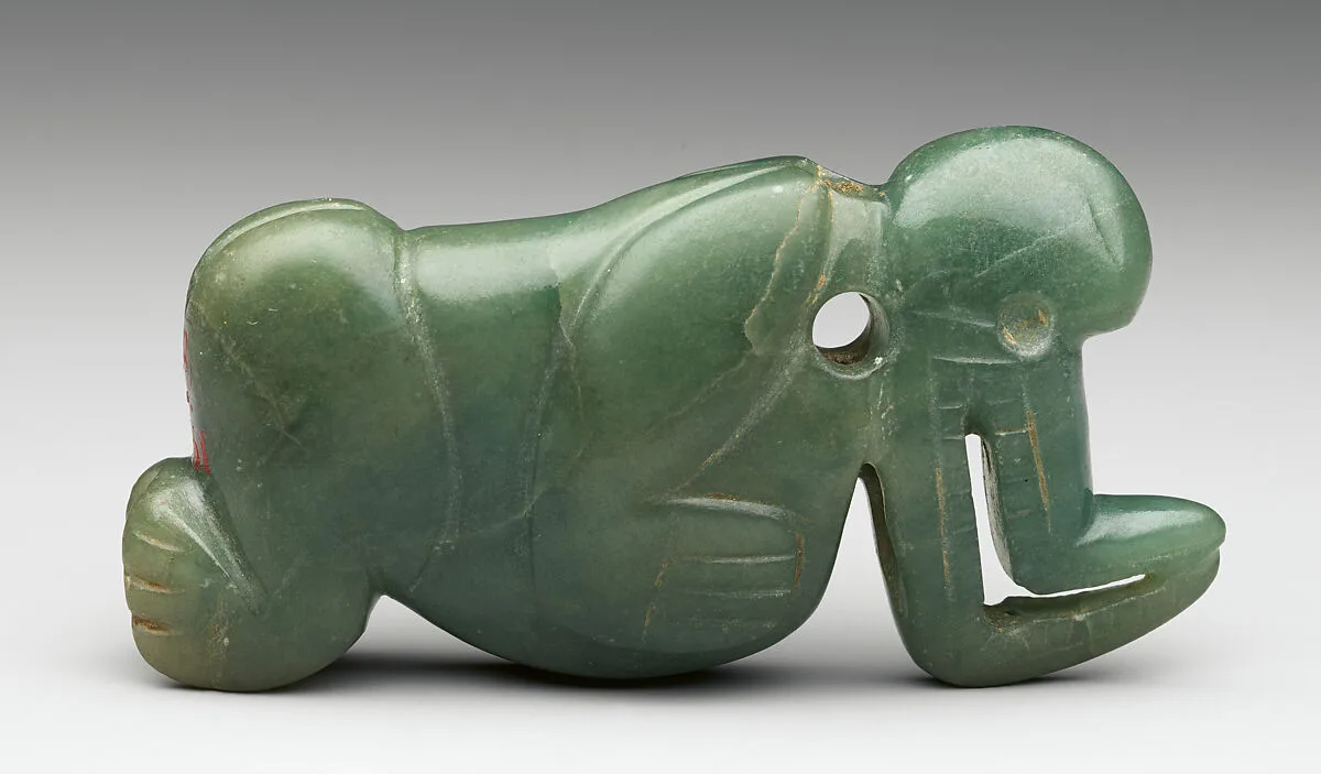 Masked Figure Pendant — Unknown