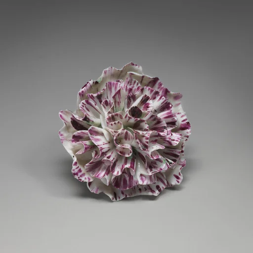 Porcelain flower (one of a set of nine)