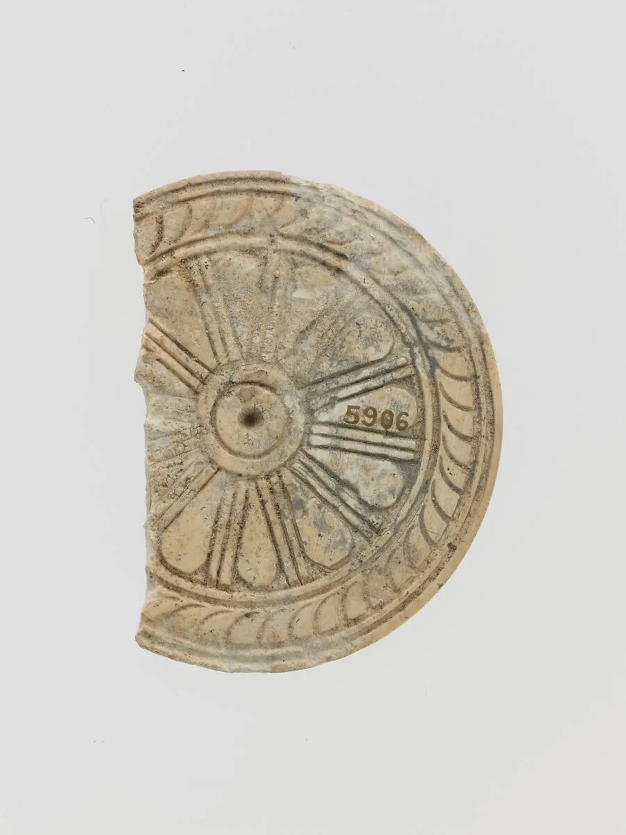 Ivory disk with rosette — Unknown