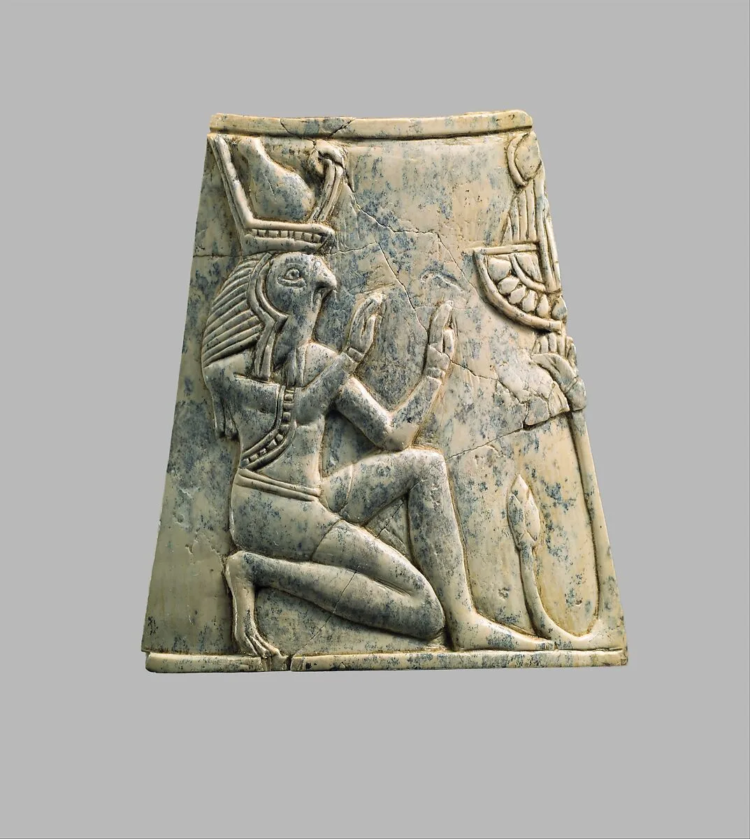 Plaque with falcon-headed Re wearing crown of Upper and Lower Egypt — Unknown