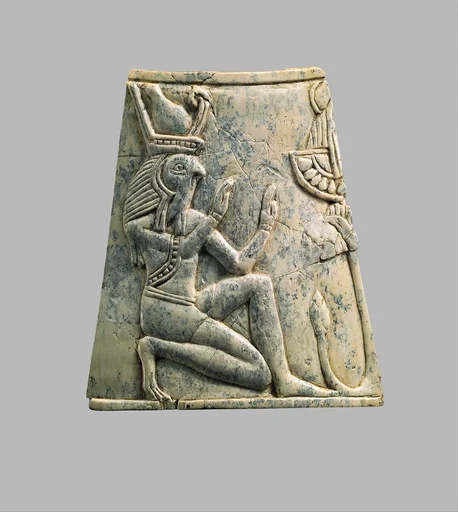 Plaque with falcon-headed Re wearing crown of Upper and Lower Egypt