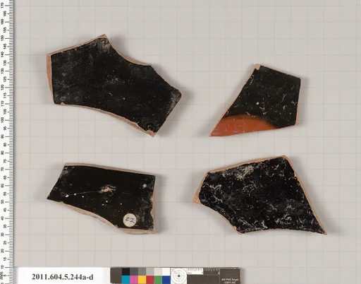 Terracotta fragments of kylikes (drinking cups)