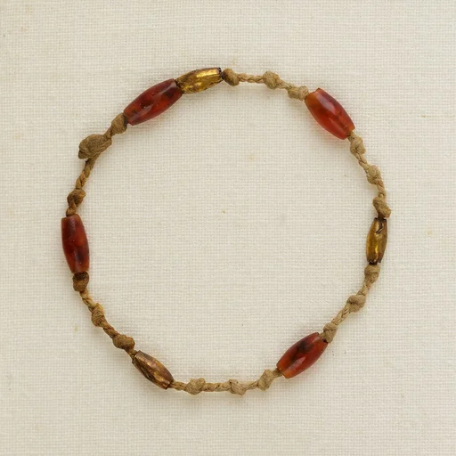Bracelet of knots and barrel beads