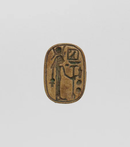 Plaque with Hathor, Mistress of Iwnw on one side, text on opposite side
