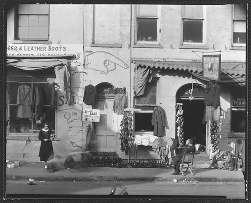 [Shoe and Clothing Storefront with Pedestrians on Sidewalk, Savannah, Georgia]